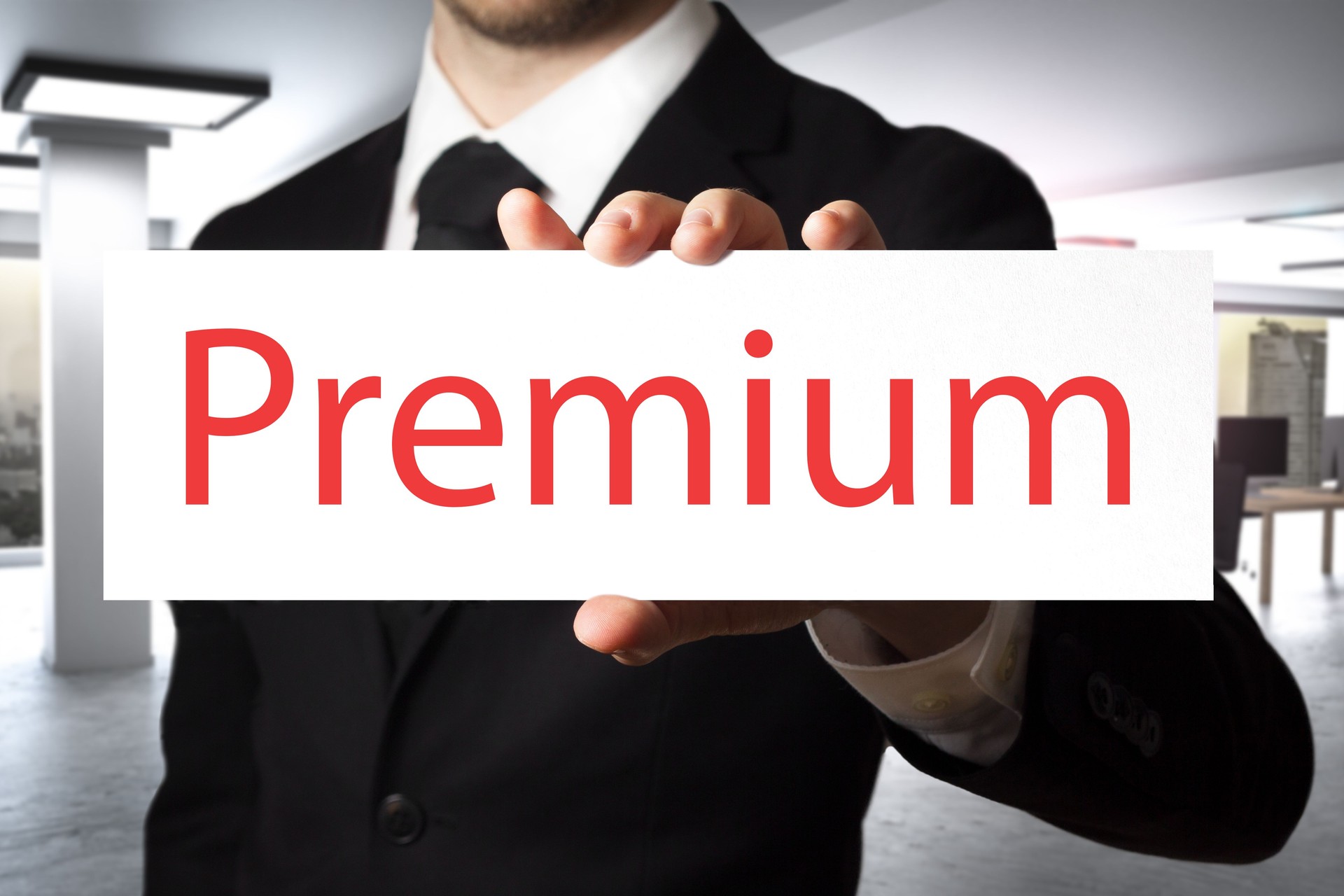 businessman holding sign premium